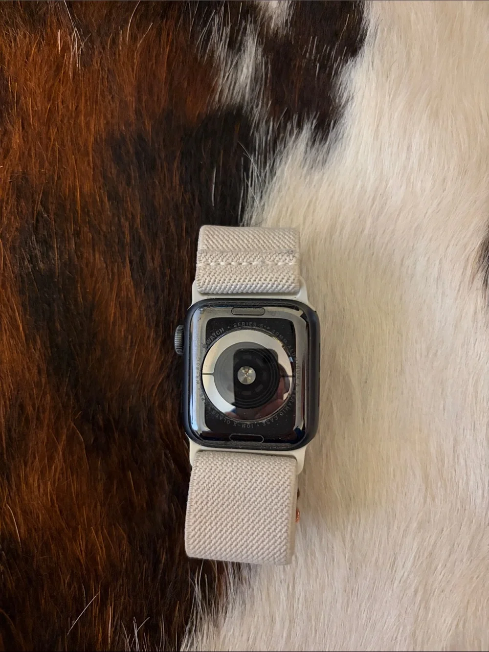 Apple Watch Series 5 with Black Case and Cream Woven Band